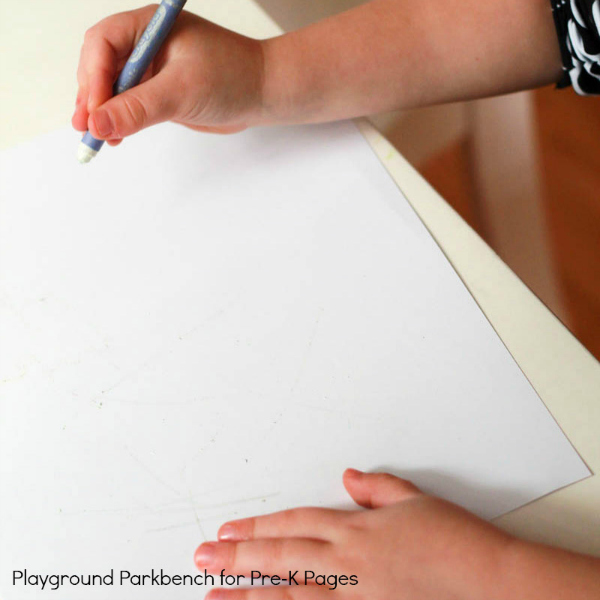 child drawing night time art on white paper
