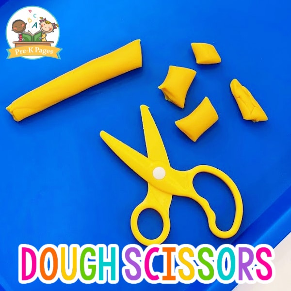 Cutting Playdough with Scissors in Preschool